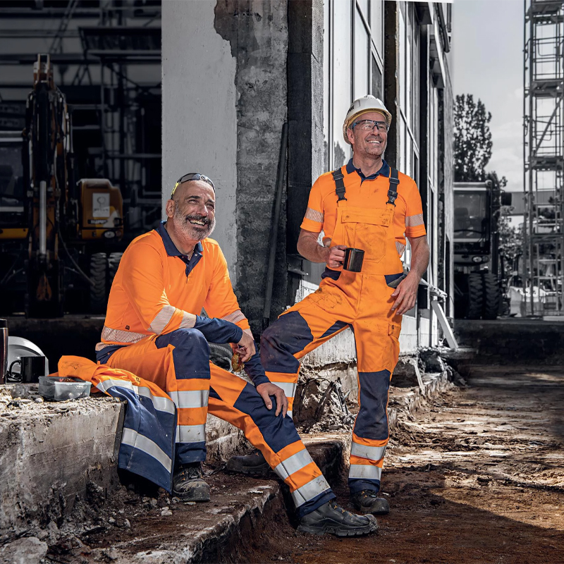 Pantaloni reflectorizanti portocaliu de lucru Uvex suXXeed Construction, marimea 44