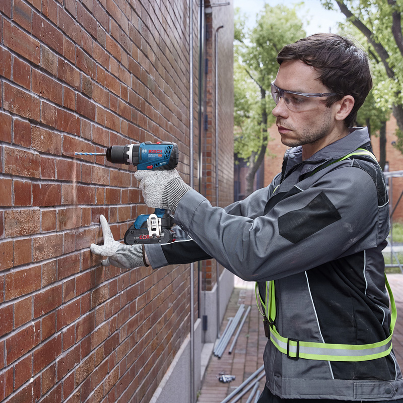 Masina de gaurit/insurubat cu percutie si acumulatori 18V Li-Ion, 2x 2.0Ah, 31/65 Nm, tip GSB 18V-65